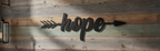 Hope Arrow 1052 on rustic wall
