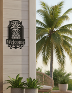 Pineapple Welcome sign on porch with palm tree